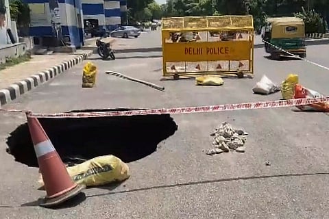 Road caved in after rain in Delhi